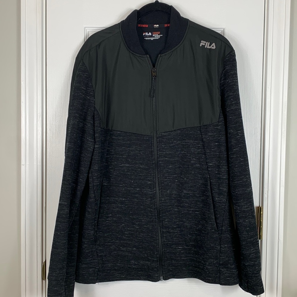 Fila Heather black long sleeved full length zip jacket size Medium.